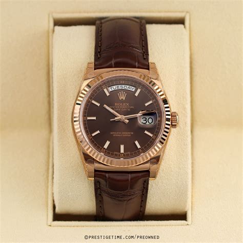 preowned rolex with chocolate interior.